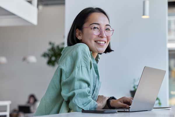 Lady on laptop taking master class